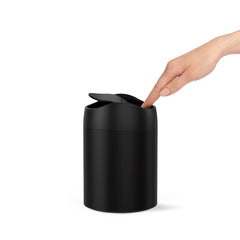 mini can - matte black - lifestyle hand image